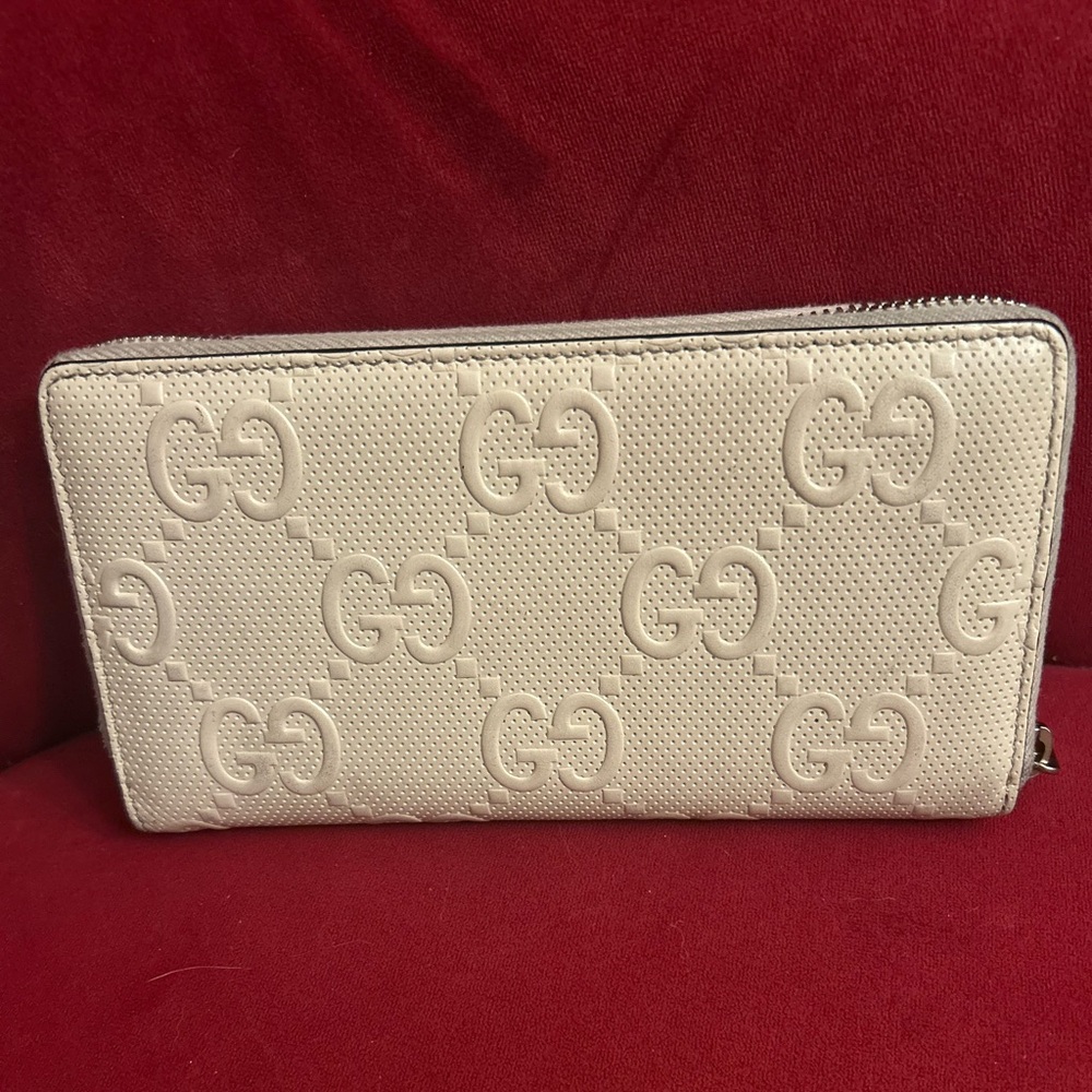 Authentic Gucci Jumbo GG embossed long zip wallet